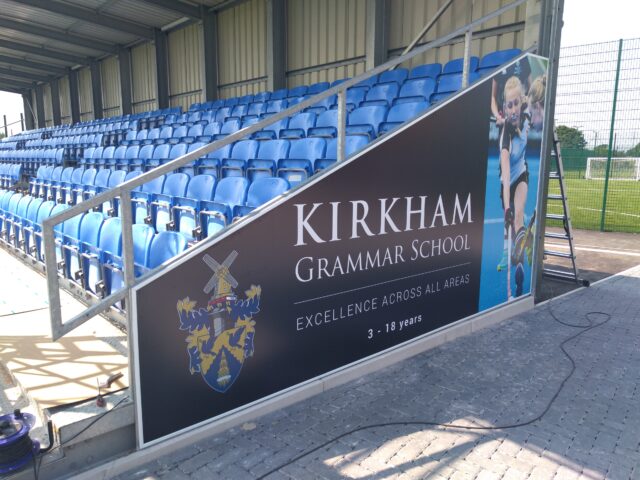 banner ad signage system at AFC Fylde for Kirkham Grammar School from BuildingSkinz