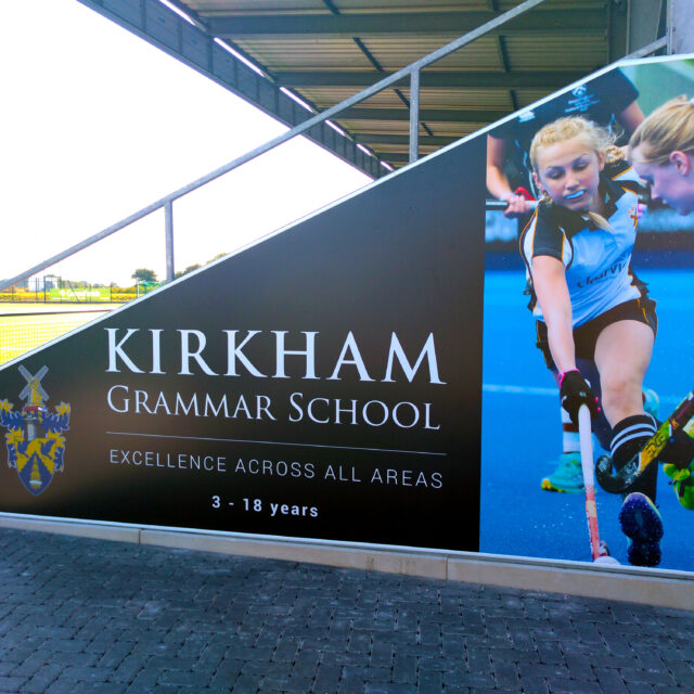 a banner ad signage system at AFC Fylde for Kirkham Grammar School from BuildingSkinz
