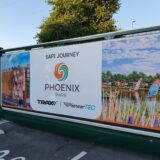 A gate / fence banner system for Phoenix Park / PioneerTech in Preston from BuildingSkinz